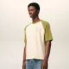 White and Green Cotton Ami De Coeur Knitted Patch T-Shirt White and Green Cotton Ami De Coeur Knitted Patch T-Shirt