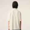 White Cotton Ami De Coeur Knitted Patch Polo White Cotton Ami De Coeur Knitted Patch Polo