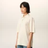 White Cotton Ami De Coeur Knitted Patch Polo White Cotton Ami De Coeur Knitted Patch Polo