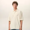 White Cotton Ami De Coeur Knitted Patch Polo White Cotton Ami De Coeur Knitted Patch Polo