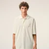 White Cotton Ami De Coeur Knitted Patch Polo White Cotton Ami De Coeur Knitted Patch Polo